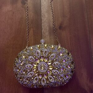 Elegant Gold and Silver Embellished Clutch